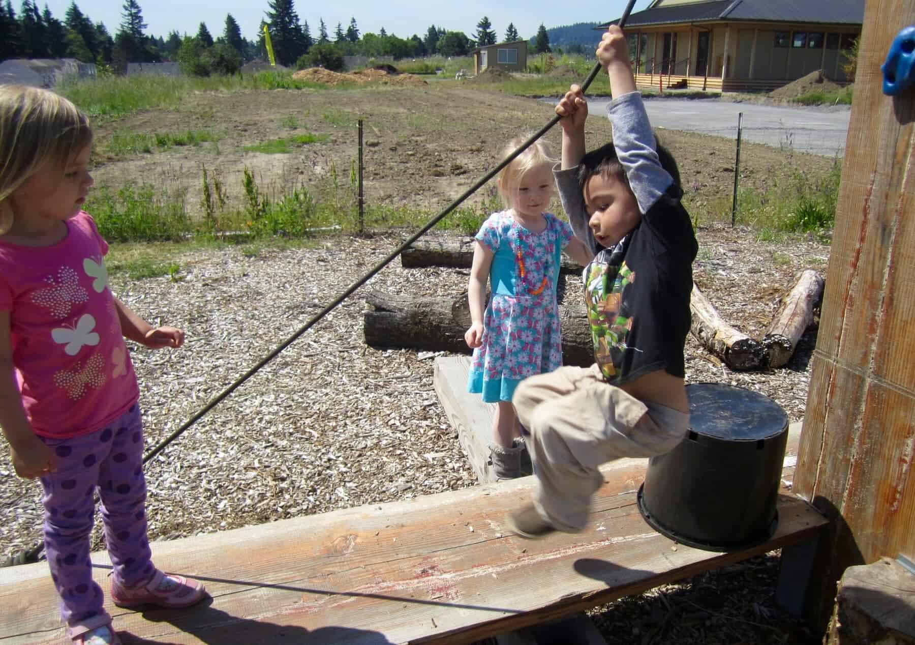 Children playing on climbing gym