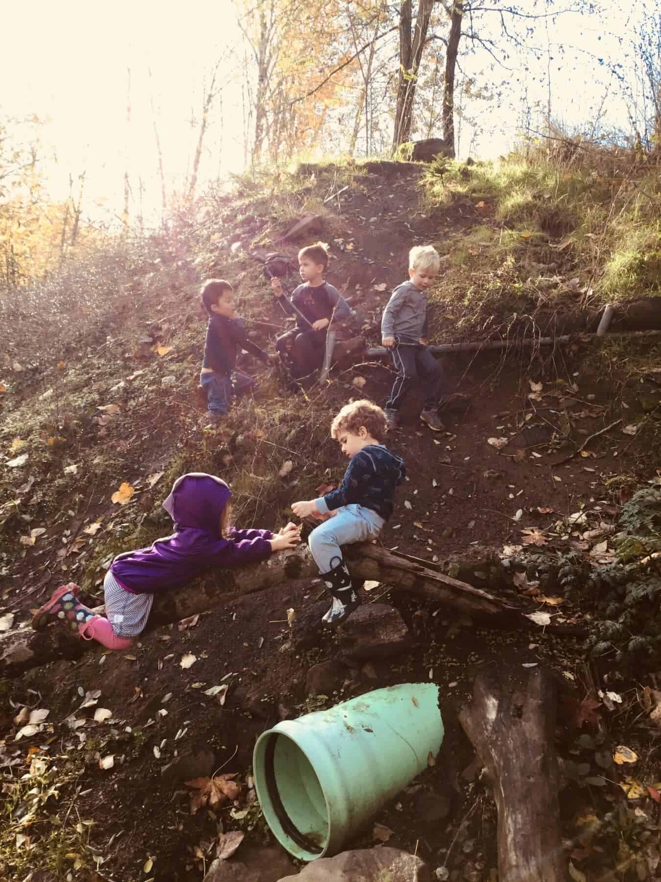 Kids playing on a hillside