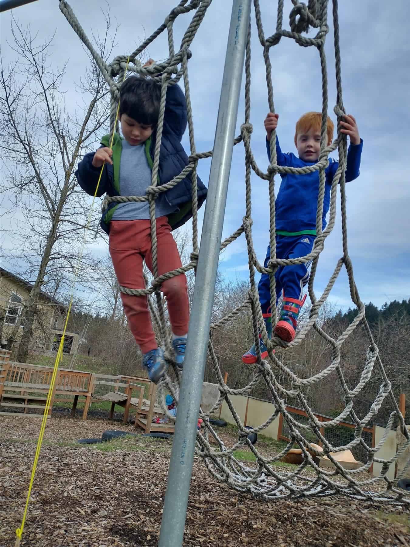 Kids on a rope ladder