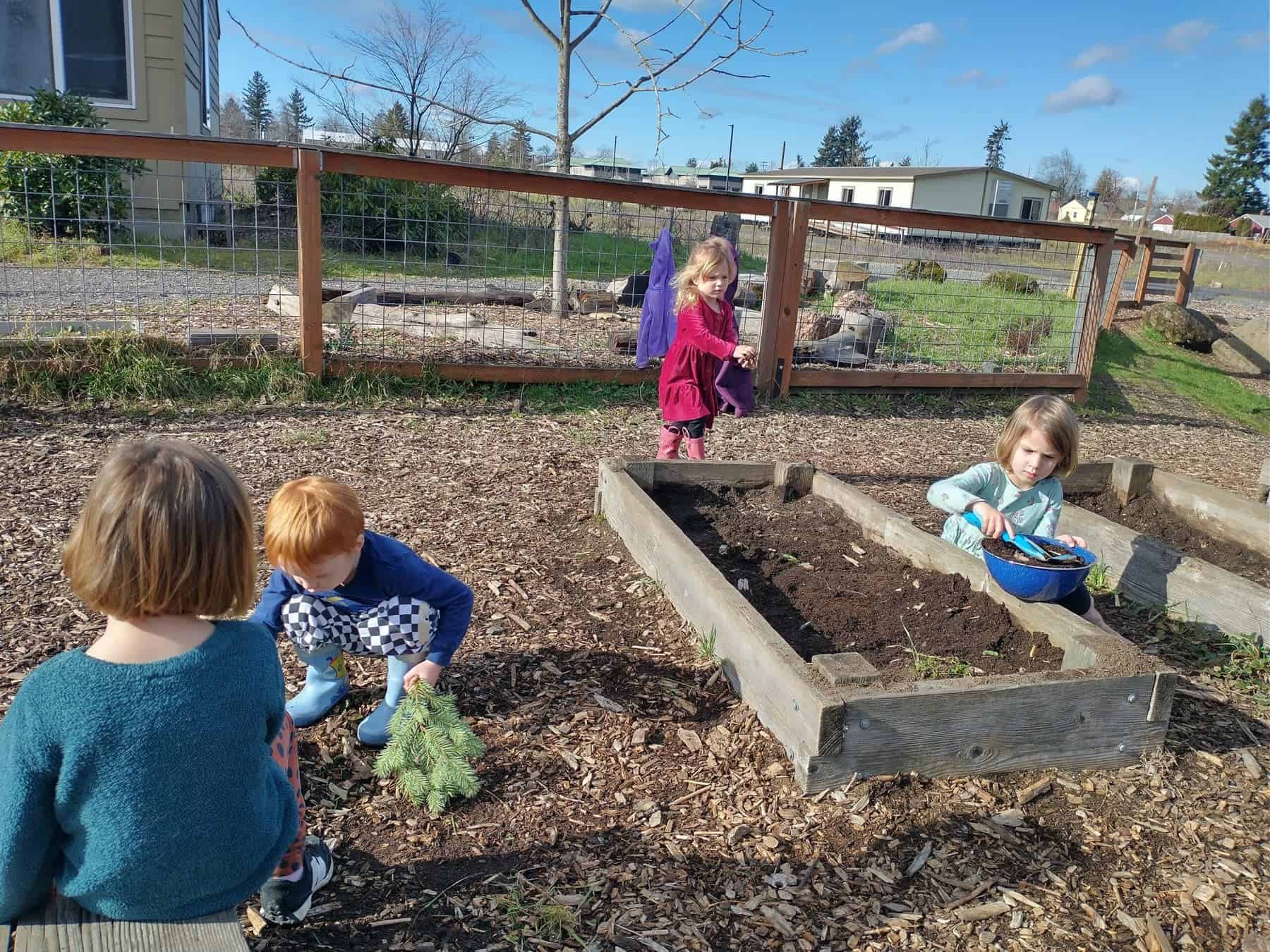 Children playing in a garden
